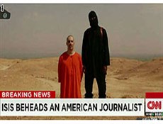 "داعش" يذبح صحفي أمريكي ويهدد بقتل آخر اذا استمرت الغارات الأمريكية