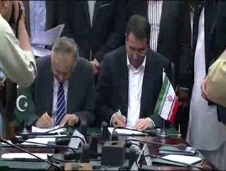 طهران وإسلام أباد توقعان مذكرة تفاهم للتعاون التجاري