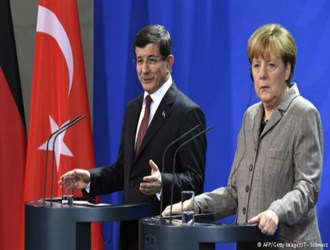 ميركل تتعهد بدعم تركيا في مواجهة الإرهاب.. واوغلو يكشف عن هوية المشتبه به بهجوم سروج